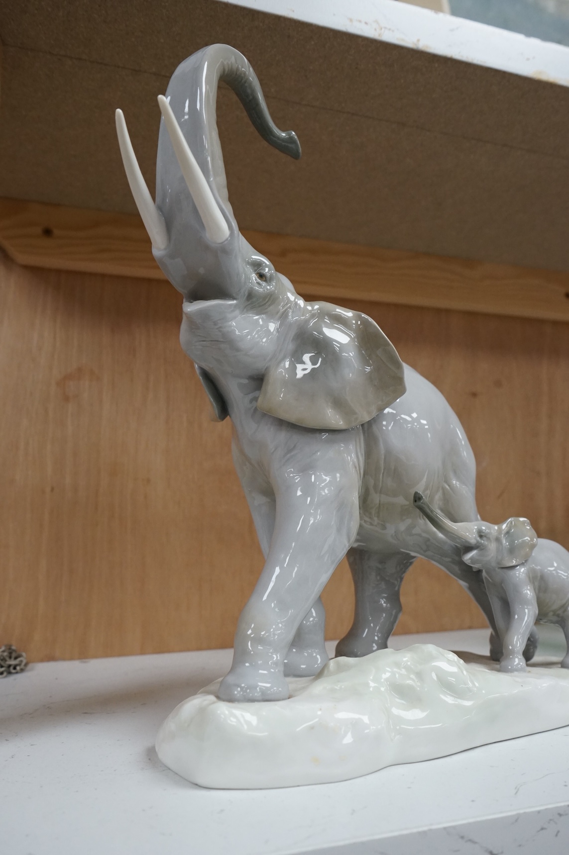 A Lladro elephant and calf figure group, 30cm high
